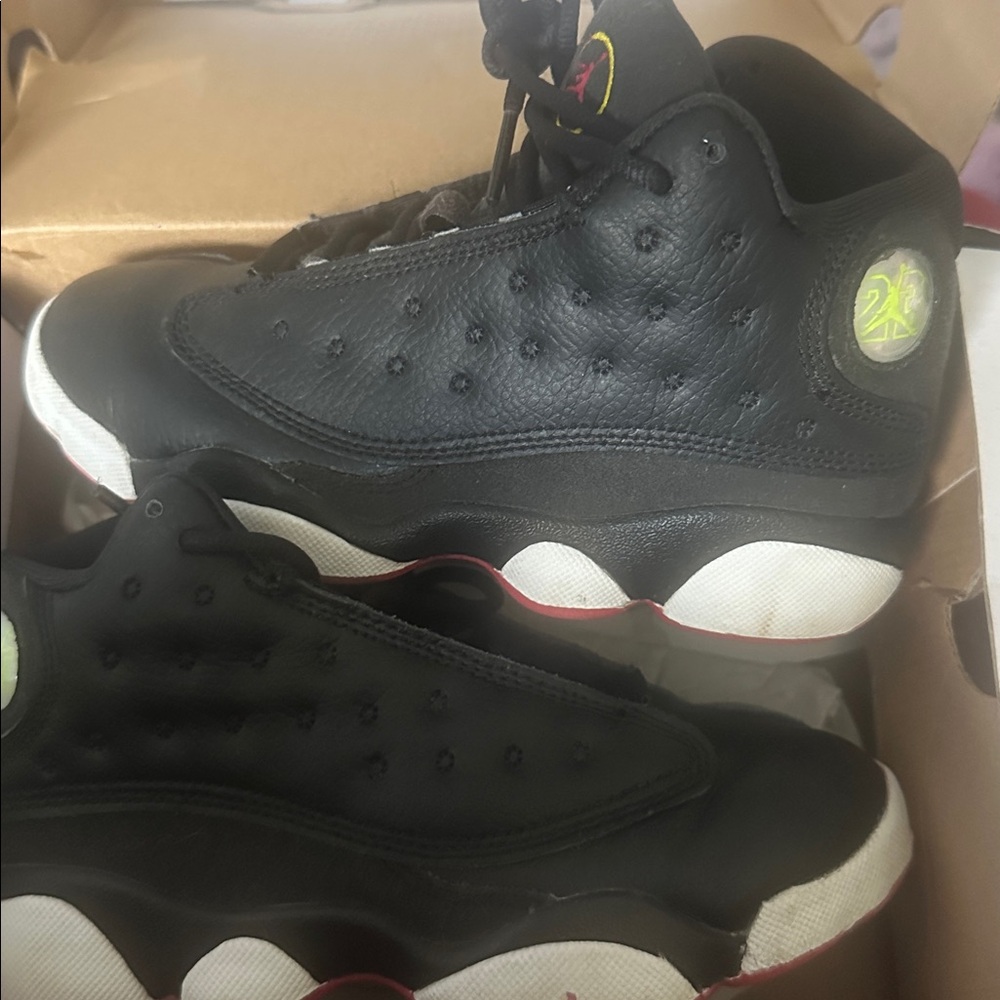 Jordan Black and White Sneakers with Red Detail